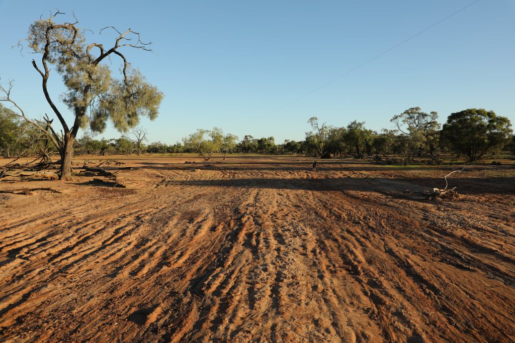 Rough ground shows the extent of topsoil scouring near on a property near Quilpie.